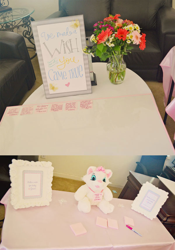 sign in for Pretty pink and purple baby shower decor